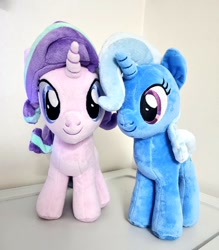 Size: 898x1024 | Tagged: safe, starlight glimmer, trixie, pony, unicorn, g4, duo, duo female, female, horn, irl, mare, photo, plushie, smiling