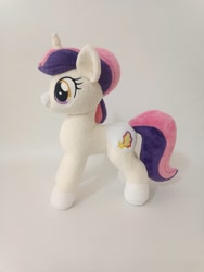 Size: 1622x2160 | Tagged: safe, artist:trueheartcraft, oc, oc only, oc:sweetieck dreams, pony, unicorn, g4, beautiful, cute, desk, female, filly, foal, horn, irl, mare, not sweetie belle, ocbetes, photo, plushie, side view, solo, unicorn horn