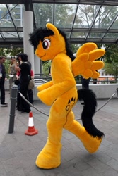 Size: 600x900 | Tagged: safe, artist:atalonthedeer, oc, oc:kazagh, human, pegasus, eurofurence, fursuit, irl, irl human, photo, ponysuit, side view, solo focus, spread wings, walking, wings