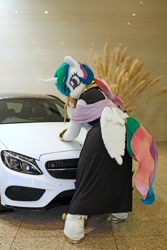 Size: 600x900 | Tagged: safe, artist:toki, princess celestia, 2017, butt wings, car, clothes, dress, fursuit, indoors, irl, jewelry, photo, ponysuit, rear view, regalia, solo, wings