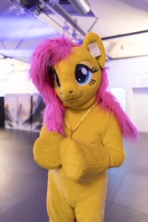 Size: 600x900 | Tagged: safe, artist:atalonthedeer, fluttershy, pony, g4, 2022, eurofurence, fursuit, irl, photo, ponysuit, solo