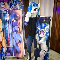 Size: 2475x2475 | Tagged: safe, artist:essorille, artist:vinylpone, dj pon-3, vinyl scratch, human, pony, unicorn, anthro, czequestria, g4, animal costume, arm hooves, blue mane, body pillow, clothes, convention, cosplay, costume, cute, dakimakura cover, equine, female, furry, fursuit, hooves, horn, indoors, irl, irl human, mare, messy mane, ponysuit, posing for photo, public, purple eyes, ruffled hair, shirt, solo, surprised