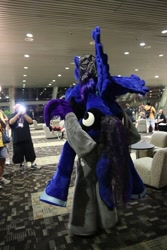 Size: 640x960 | Tagged: safe, artist:atalonthedeer, artist:judhudson, princess luna, oc, oc:echo, alicorn, bat pony, human, g4, bat pony oc, convention, duo focus, fursuit, indoors, irl, irl human, photo, ponysuit, rear view, riding on back, spread wings, wings