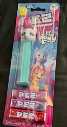 Size: 1842x3486 | Tagged: safe, izzy moonbow, sunny starscout, zipp storm, earth pony, pegasus, pony, unicorn, g5, horn, irl, merchandise, pez dispenser, photo, photography