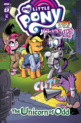 Size: 2063x3131 | Tagged: safe, artist:andy price, idw, official comic, applejack, pinkie pie, rarity, spike, bird, crow, dragon, earth pony, pony, unicorn, g4, my little pony classics reimagined: the unicorn of odd, official, spoiler:comic, and then there's rarity, applejack is not amused, applejack's hat, axe, beret, bipedal, camera, clothes, comic cover, cover, cover art, cowboy hat, cut, director, dorothy gale, female, freckles, hat, high res, horn, male, mare, marshmelodrama, megaphone, movie, my little pony logo, nick chopper, overalls, rarity being rarity, scarecrow, set, smiling, speech bubble, the scarecrow, the unicorn of odd, the wizard of oz, tin, tin man, tin pony, tin woodsman, tongue out, tree stump, unamused, weapon, yelling, yellow brick road