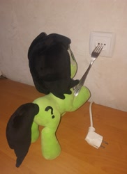 Size: 2716x3732 | Tagged: safe, photographer:anonymous, oc, oc:filly anon, pony, g4, /mppp/, cable, electrical outlet, female, female oc, filly, filly oc, foal, fork, imminent electrocution, indoors, irl, on table, photo, plushie, pony oc, pony plushie, power plug, solo, this will end in death, too dumb to live