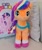 Size: 1437x1723 | Tagged: safe, sunny starscout, twilight sparkle, alicorn, earth pony, pony, g4, g5, official, bag, coat markings, cross-eyed, hasbro city, irl, looking forward, mane stripe sunny, merchandise, photo, pillow, plushie, quadrupedal, smiling, socks (coat markings), spread wings, standing, sunny and her heroine, sunny's bag, twilight sparkle (alicorn), unshorn fetlocks, wings