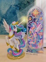 Size: 2441x3255 | Tagged: safe, kotobukiya, princess celestia, alicorn, g4, official, acrylic plastic, acrylic standee, cloud, craft, indoors, kotobukiya princess celestia, looking at you, magic, magic aura, merchandise, solo, spread wings, stained glass, stars, sun, wings