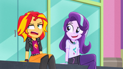 Size: 1920x1080 | Tagged: safe, artist:orin331, starlight glimmer, sunset shimmer, human, equestria girls, g4, alternate hairstyle, annoyed, bracelet, choker, clothes, crossed legs, eyebrows, fake screencap, film grain, geode, human starlight, human sunset, jacket, jewelry, leather, leather jacket, leggings, open mouth, raised eyebrow, redesign, short hair, shorts, sitting, smiling