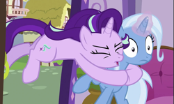 Size: 893x531 | Tagged: safe, screencap, starlight glimmer, trixie, pony, unicorn, all bottled up, g4, my little pony: friendship is magic, cropped, duo, glowing, glowing horn, horn, tackle