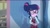 Size: 2155x1216 | Tagged: safe, screencap, sci-twi, twilight sparkle, human, equestria girls, g4, my little pony equestria girls: friendship games, book, clothes, crystal prep academy, crystal prep academy uniform, female, glasses, hair bun, hallway, indoors, lidded eyes, necktie, plaid skirt, pleated skirt, reflection, school, school tie, school uniform, schoolgirl, shelves, singing, skirt, solo, uniform, what more is out there