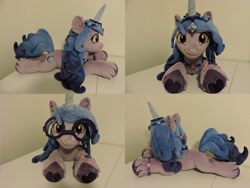 Size: 1597x1199 | Tagged: safe, artist:little-broy-peep, izzy moonbow, pony, unicorn, g5, glasses, horn, indoors, irl, lying down, photo, plushie, prone, solo