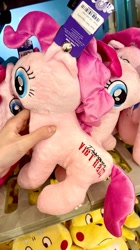 Size: 1079x1920 | Tagged: safe, pinkie pie, earth pony, human, pony, g4, bootleg, female, implied vietnam, indoors, irl, irl human, mare, photo, plushie, seems legit, vietnamese