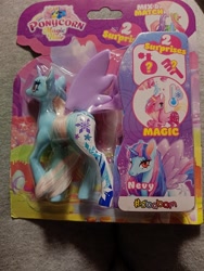 Size: 3072x4096 | Tagged: safe, photographer:hollyn, pony, horn, nevy, photo, ponycorn magic hair, toy, wings