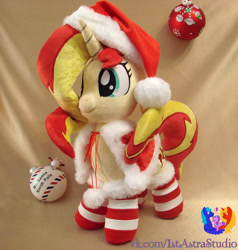 Size: 2190x2304 | Tagged: safe, artist:1stastrastudio, sunset shimmer, pony, unicorn, g4, c:, christmas, clothes, costume, cute, female, hat, holiday, irl, mare, photo, plushie, santa costume, santa hat, smiling, socks, solo, striped socks