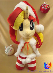 Size: 2128x2904 | Tagged: safe, artist:1stastrastudio, sunset shimmer, pony, unicorn, g4, c:, christmas, clothes, costume, cute, female, hat, holiday, irl, looking at you, mare, photo, plushie, santa costume, santa hat, shimmerbetes, smiling, socks, solo, striped socks