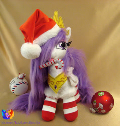 Size: 1280x1347 | Tagged: safe, artist:1stastrastudio, princess celestia, pony, princess molestia, candy, candy cane, clothes, food, irl, mouth hold, photo, plushie, socks, solo, striped socks