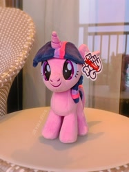 Size: 2030x2707 | Tagged: safe, reesee, twilight sparkle, alicorn, pony, g4, official, chair, fixed, front view, irl, merchandise, miniso, photo, plushie, pony plushie, reflection, smiling, solo, twilight sparkle (alicorn)