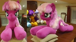 Size: 4032x2268 | Tagged: safe, artist:ponimalion, cheerilee, pony, g4, bedroom eyes, female, irl, lidded eyes, life size, mare, photo, pillow, plushie, smiling, tail