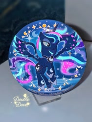 Size: 1752x2336 | Tagged: safe, princess luna, g4, official, badge, glow in the dark, irl, merchandise, moon, photo, rainbow power, rainbow power-ified, raised hoof, spread wings, stars, transparent mane, wings