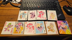 Size: 4000x2252 | Tagged: safe, applejack, fluttershy, pinkie pie, rainbow dash, rarity, spike, twilight sparkle, alicorn, dragon, earth pony, pegasus, pony, unicorn, g4, official, ace of clubs, ace of diamonds, ace of hearts, ace of spades, female, flying, horn, mane six, mare, merchandise, photo, playing card, stock vector, twilight sparkle (alicorn)