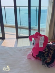 Size: 3082x4109 | Tagged: safe, reesee, pinkie pie, pony, g4, official, bedroom, chinese, clothes, curtains, door, dress, indoors, irl, lying down, merchandise, ocean, outfit, photo, plushie, pony plushie, rear view, solo, water