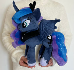 Size: 1000x950 | Tagged: safe, symbiote studios, princess luna, alicorn, human, pony, g4, female, irl, irl human, mare, photo, plushie, solo