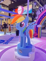 Size: 3024x4032 | Tagged: safe, rainbow dash, pegasus, pony, g4, official, chinese, indoors, irl, photo, side view, smiling, spread wings, standing, statue, text, wings