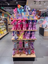 Size: 4284x5712 | Tagged: safe, artist:andrew hickinbottom, reesee, applejack, fluttershy, pinkie pie, rainbow dash, rarity, twilight sparkle, alicorn, pony, g4, official, chinese, doll, hearth's warming doll, indoors, irl, kayou, keychain, looking at you, mane six, merchandise, photo, plushie, pony plushie, smiling, store, text, toy, twilight sparkle (alicorn)