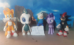 Size: 4217x2592 | Tagged: safe, starlight glimmer, oc, oc:bx-8, dragon, unicorn, g4, adventure time, crossover, customized toy, dragon oc, female, figurine, finn the human, happy new year 2025, horn, irl, male, miles "tails" prower, non-pony oc, photo, shadow the hedgehog, sonic the hedgehog (series), toy