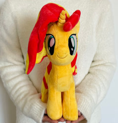 Size: 1000x1044 | Tagged: safe, symbiote studios, sunset shimmer, human, pony, unicorn, g4, female, horn, irl, irl human, looking at you, mare, merchandise, photo, plushie, solo