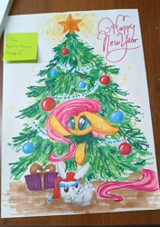 Size: 2241x3169 | Tagged: safe, artist:just_yuki, angel bunny, fluttershy, pegasus, pony, g4, christmas, christmas tree, happy new year, hat, holiday, marker drawing, new year, pet, santa hat, traditional art, tree