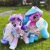 Size: 1728x1728 | Tagged: safe, artist:brella, photographer:brella, radiant hope, starlight glimmer, crystal pony, pony, unicorn, g4, cat ears, clothes, dress, duo, female, horn, irl, lidded eyes, mare, photo, plushie, s5 starlight, shoes, sneakers, socks