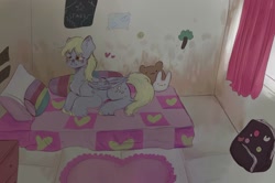 Size: 1280x849 | Tagged: safe, artist:sleepybooocharlie, derpy hooves, pegasus, pony, g4, backpack, bed, female, lying down, mare, plushie, prone, solo, unshorn fetlocks