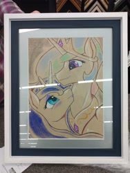Size: 3120x4160 | Tagged: safe, artist:edgarkingmaker, princess celestia, princess luna, alicorn, pony, g4, colored pencil drawing, crown, duo, duo female, etsy, eye contact, female, framed picture, high res, jewelry, looking at each other, looking at someone, mare, peytral, photo, regalia, royal sisters, siblings, sisters, smiling, smiling at each other, spread wings, traditional art, wings