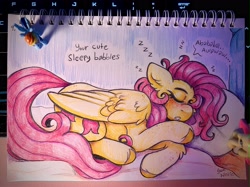Size: 4031x3023 | Tagged: safe, artist:yumkandie, fluttershy, rainbow dash, pegasus, pony, g4, bed, blushing, eyebrows, eyes closed, female, figurine, lesbian, lying down, on bed, onomatopoeia, pencil drawing, pillow, ship:flutterdash, shipping, sleeping, snoring, solo, sound effects, traditional art, wings, zzz