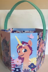 Size: 2157x3256 | Tagged: safe, izzy moonbow, sunny starscout, g5, basket, box, easter basket, front view, panorama, patterned background