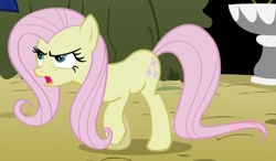 Size: 678x396 | Tagged: safe, screencap, fluttershy, earth pony, pony, g4, season 2, the return of harmony, annoyed, cropped, discorded, earth pony fluttershy, female, flutterbitch, fluttercruel, frown, looking at someone, mare, missing wing, offscreen character, open mouth, race swap, solo, walking