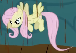 Size: 329x229 | Tagged: safe, screencap, fluttershy, pegasus, pony, g4, season 2, the return of harmony, chocolate, chocolate rain, cropped, discorded, female, flutterbitch, fluttercruel, flying, food, looking at someone, looking down, mare, offscreen character, rain, solo