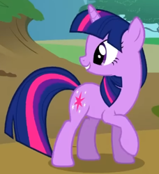 Size: 316x347 | Tagged: safe, screencap, twilight sparkle, pony, unicorn, g4, season 2, the return of harmony, cropped, cute, female, grin, looking at someone, looking back, mare, open mouth, raised hoof, smiling, solo, standing, turned head, twiabetes, unicorn twilight