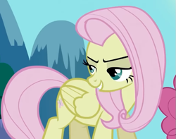 Size: 659x520 | Tagged: safe, screencap, fluttershy, pegasus, pony, g4, season 2, the return of harmony, bedroom eyes, cropped, discorded, female, flutterbitch, fluttercruel, folded wings, grin, lidded eyes, looking back, mare, offscreen character, smiling, solo, standing, sultry, turned head, wings