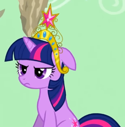 Size: 429x436 | Tagged: safe, screencap, twilight sparkle, pony, unicorn, g4, season 2, the return of harmony, annoyed, big crown thingy, cropped, ears back, element of magic, female, floppy ears, jewelry, looking at someone, mare, offscreen character, regalia, sitting, solo, unicorn twilight