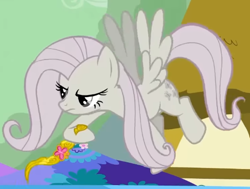 Size: 514x389 | Tagged: safe, screencap, fluttershy, pegasus, pony, g4, season 2, the return of harmony, cropped, discorded, element of kindness, female, flutterbitch, fluttercruel, flying, hoof hold, mare, solo