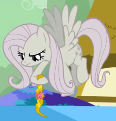 Size: 438x459 | Tagged: safe, screencap, fluttershy, pegasus, pony, g4, season 2, the return of harmony, cropped, discorded, element of kindness, female, flutterbitch, fluttercruel, flying, hoof hold, looking at something, mare, solo