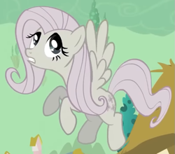 Size: 543x478 | Tagged: safe, screencap, fluttershy, pegasus, pony, g4, season 2, the return of harmony, cropped, discorded, female, flutterbitch, fluttercruel, flying, looking up, mare, solo