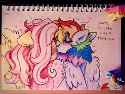 Size: 680x510 | Tagged: safe, artist:yumkandie, fluttershy, rainbow dash, pegasus, pony, g4, blushing, cheek kiss, duo, ear piercing, earring, ears back, eyebrows, eyebrows visible through hair, eyes closed, female, figurine, floating heart, flustered, heart, hiding behind mane, jewelry, kissing, lesbian, love, nose piercing, pencil drawing, piercing, ship:flutterdash, shipping, shy, traditional art, wings