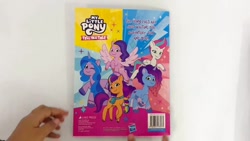 Size: 1280x720 | Tagged: safe, izzy moonbow, misty brightdawn, pipp petals, sunny starscout, zipp storm, earth pony, pegasus, unicorn, g5, my little pony: tell your tale, official, 2d, adorapipp, adorazipp, book, coloring book, cover, cute, izzybetes, merchandise, mistybetes, photo, rebirth misty, sunnybetes