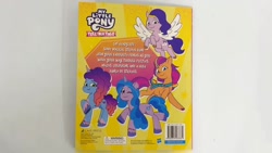 Size: 1280x720 | Tagged: safe, izzy moonbow, misty brightdawn, pipp petals, sunny starscout, earth pony, pegasus, unicorn, g5, my little pony: tell your tale, official, 2d, activity book, adorapipp, book, coloring book, cover, cute, flying, izzybetes, looking at you, merchandise, mistybetes, photo, rebirth misty, simple background, smiling, smiling at you, standing, sunnybetes, yellow background