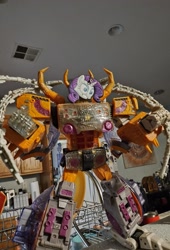 Size: 2712x4000 | Tagged: safe, rarity, g4, irl, keychain, photo, toy, transformers, unicron