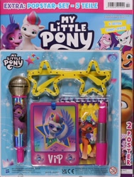 Size: 907x1200 | Tagged: safe, egmont, hitch trailblazer, pipp petals, sunny starscout, zipp storm, g5, my little pony: tell your tale, official, crown, german, germany, jewelry, magazine, merchandise, microphone, notepad, photo, regalia, stars, sunglasses